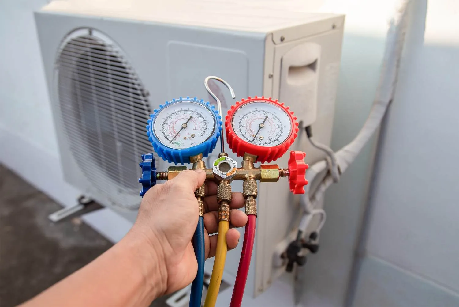 Gauges attached to an outdoor air conditioner